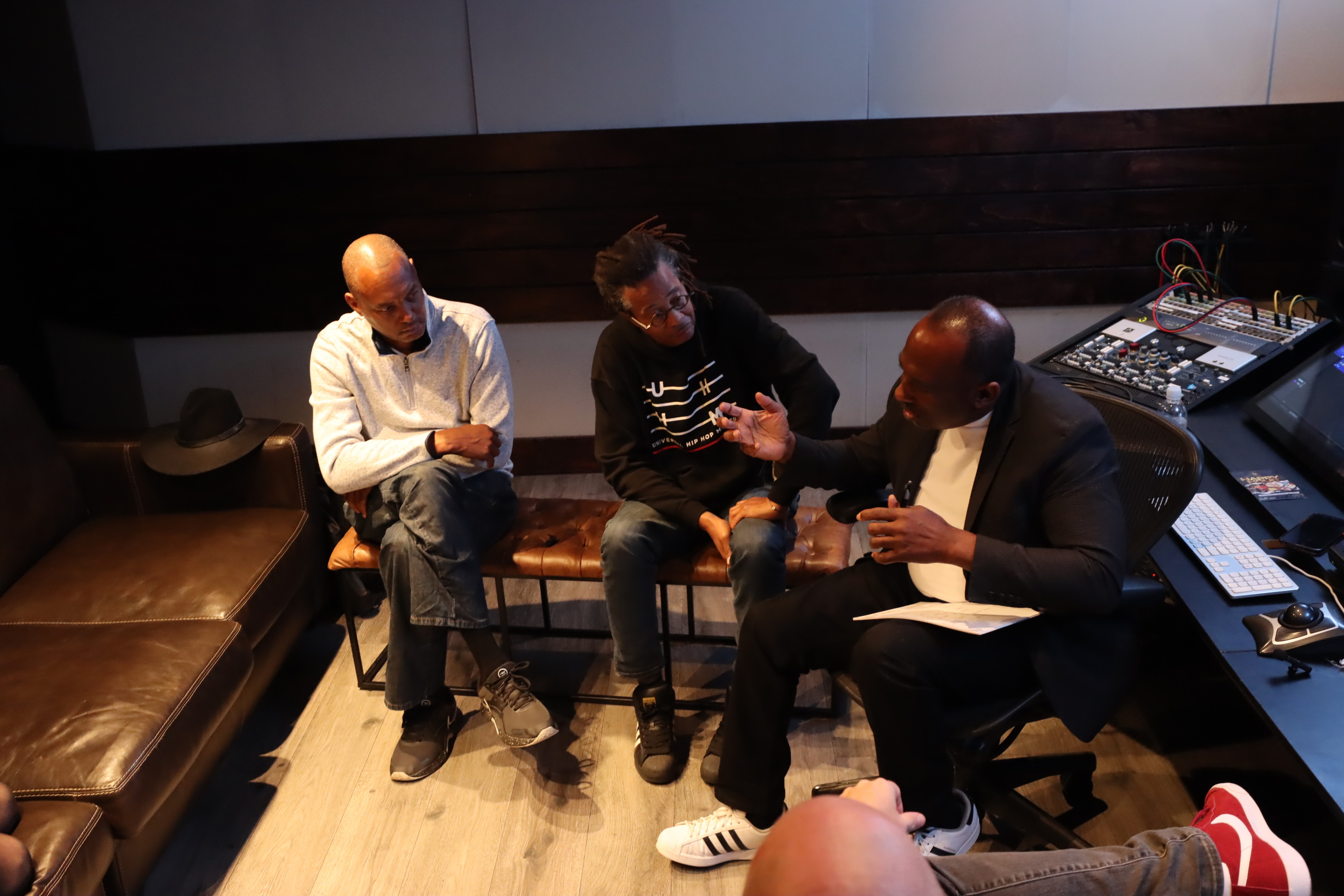 L-R: Reggie Peters, Eric Orr, and Elai Tubo of the Hip Hop Museum